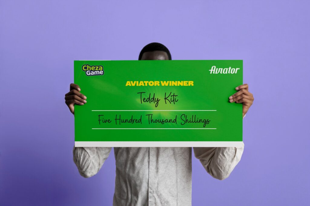 Aviator Player Bags Sh500,000, Hides Face During Cheque Presentation