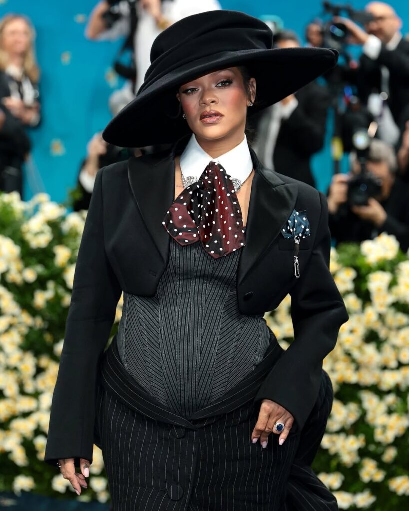 Singer Rihanna Debuts Baby Bump at Met Gala [Photos]